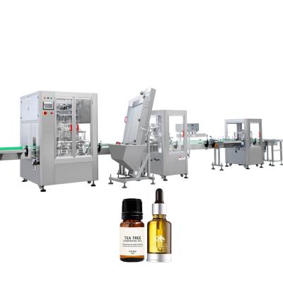 China Automatic Volumetric Food Dropper Bottle Essential Oil Filling Machine And Labeling Capping Machine for sale