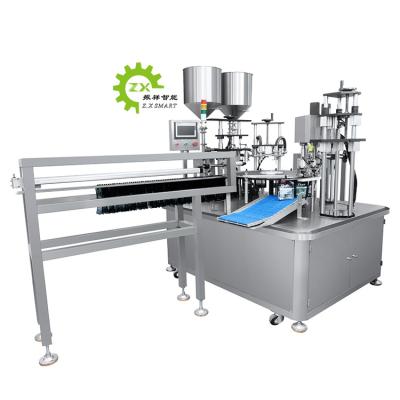 China Automatic Pouch Juice Jelly Twist Off Rotary Spout Food Filling and Capping Machine for sale