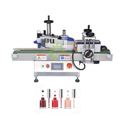 China Food desktop automatic sticker labeling machine for round bottles cans jars labeling machine for sale