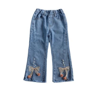 China 2-9 Years New Fashion Toddler Kids Blue Jeans Bow Tie Color Fade Proof Flared Pants With Pearl for sale