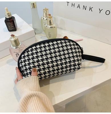 China Fashion Zebra Stripes Houndstooth Canvas Fashion Toiletry Travel Makeup Cosmetic Bag for sale