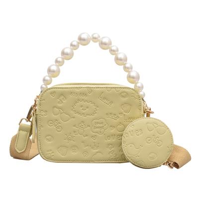 China Fashion New Fashion Small Square Bag Texture Body Bag Pearl Handle Cross Women Bag for sale