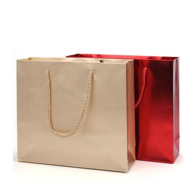 China Factory Sale Recyclable Drawstring Handle Gold Paper Gift High Quality Paper Bag For Jewelry for sale