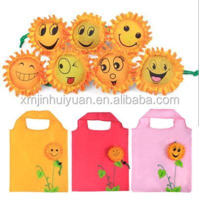 China Eco-Friendly Customize Logo 190T Nylon / Eco-Friendly Foldable Oxford Sunflower Face Smile Reusable Folding Shopping Bag for sale