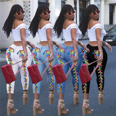 China QUICK DRY Women's Casual Pants Pants Rainbow Bandage Slim Fit Ripped Denim Pants Skinny Women's Jeans for sale