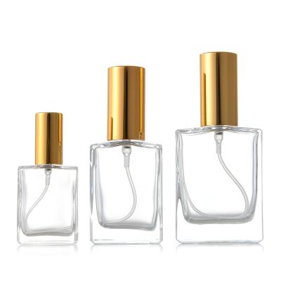 China Wholesale Personal Care Customized Decorative Cosmetic Liquid Refillable Empty Square Glass Perfume Bottles Packaging With Aluminum Spray Cap for sale