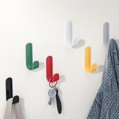 China Multi-Function Adhesive Wall Hanging Hook Coat Back Door J-Hook Single Color Plastic Hook Without Kitchen Viable Hole for sale