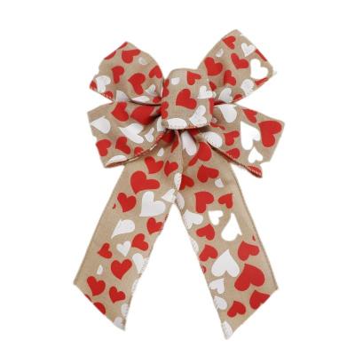 China Valentine's day decoration factory low price red hearts printed flower ribbon bow valentines day gift decorative bows for sale