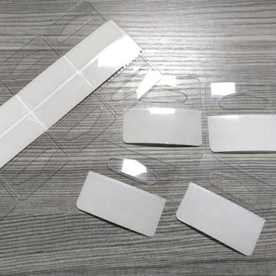 China Hang Sundries Stocked / Customized Self Adhesive Supermarket Hang Tabs Plastic Sticker Hooks Custom Hole Eco-Friendly Euro PET Eco-Friendly for sale