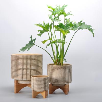 China Eco-friendly Minimalist Material Design Bamboo Cement Pedestal Embossed Nordic Checkered Bonsai Flower Pot for sale