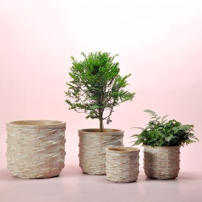 China Eco-friendly European Style Rattan Embossed Pattern Indoor Decor Cement Garden Table Pots for sale