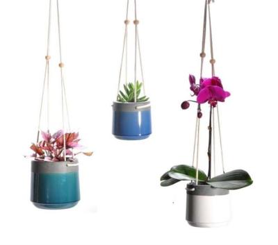 China Eco-friendly Modern Creative Handmade Ceramic Indoor Rope Pot Flower Style Hanging Planter Planters for sale