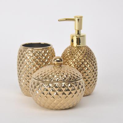 China Sustainable Luxury Emboss Design Foam Soap Dispenser Bottle Cup Jewelry Jar With Lid Gold Plating Ceramic Bathroom Sets For Hotel for sale