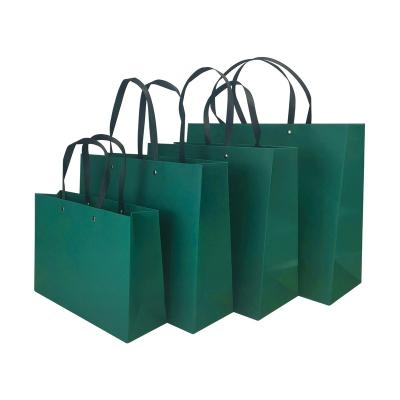 China Handmade Clothes Kraft Paper Shopping Solid Bag With Your Own Logo for sale