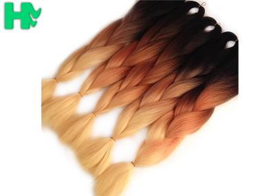 China El enredo trenzado sintético natural de la onda del Afro de los pedazos del pelo de Ombre libera en venta