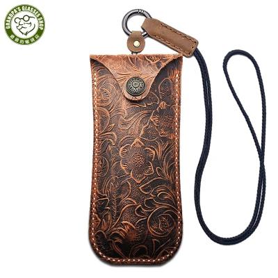 China Portable Luxury Handmade Unique Patterned First Seat Cowhide Leather Glasses Sheath Bag Reading Genuine Leather Eye Glass Case Pouch for sale