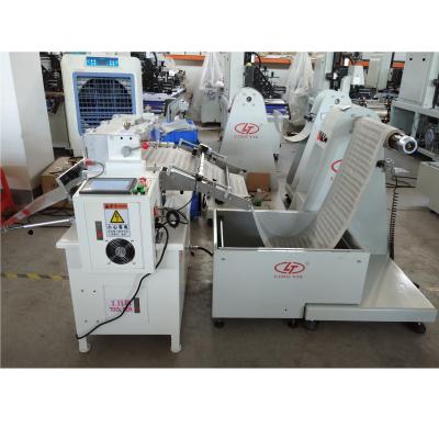 China CLOTHING Roll To Cover Paper Cutting Machine For PET, PVC, PP, BOPP Roll Film for sale