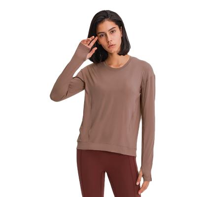 China Elegant women's simple cross inner shirts long back tee long quick-drying new line sports leisure splicing sleeve for sale