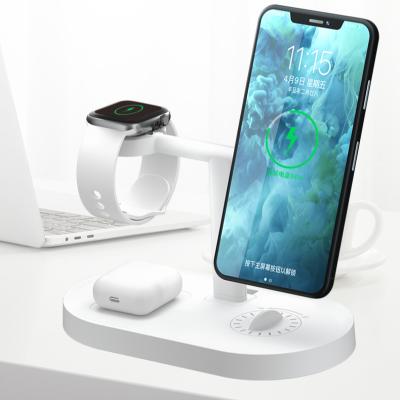 China Wireless Video Game Player Multifuncion Phone Charger Stand Three-in-One Wireless Charging Stand For Smart Watch Headset for sale