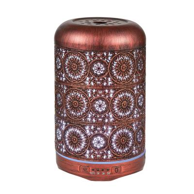 China Newest Hotel Iron Art Hollow Design 250ml Large Capacity Aromatherapy Red Bronze Diffuser for sale