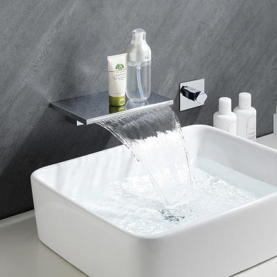 China 35MM Valve Seat Diameter Hot and Cold Waterfall Spout Bathroom Sink Tap for Wall Basin for sale