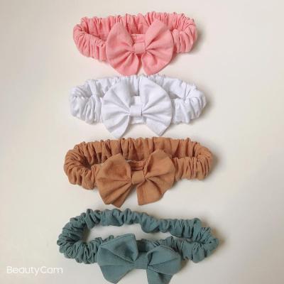 China Soft/Flexible High Quality Baby Kid Comfortable Cute Mini Pink Headband Elastic Bow Fit Hair Band for sale