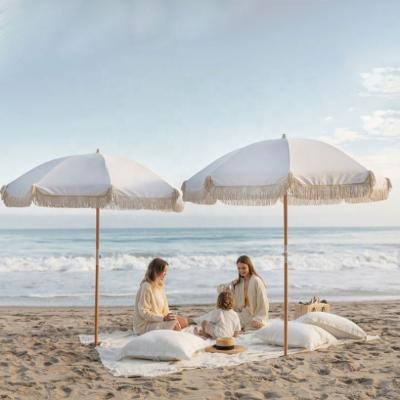 China Premium Commercial Waterproof Professional Manufacturer, 7.5Ft UV Protection White Cotton Canopy Fiberglass With Tassels Beach Umbrellas for sale