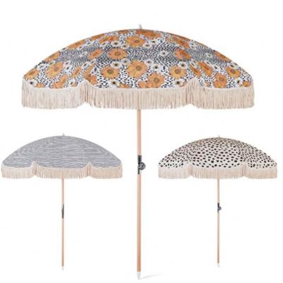 China Garden Waterproof Outdoor UV Protection Fringed Beach Umbrella With Wooden Pole Cotton Tassel And Sling Folding Beach Chair for sale