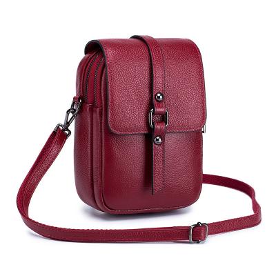 China Waterproof female leather sling bags small bag for phone Girl's designer shoulder summer pcak trendy bags for girl for sale