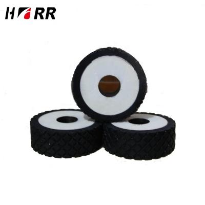 China Machinery Parts Wear-resisting PU Lamination Polyurethane Rice Mill Rubber Coated Plastic Roller With Steel Shaft For Conveyor System for sale