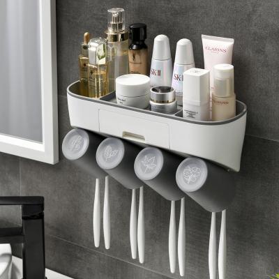 China 4 Cup Multifunctional Wall Mounted Plastic Dispenser Toothpaste Dispenser And Toothbrush Holder Sets for sale