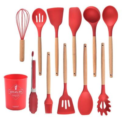 China Viable Hot Selling Red Amazon Silicone Egg Beater Kitchenware Set With Wooden Handle Utensils for sale