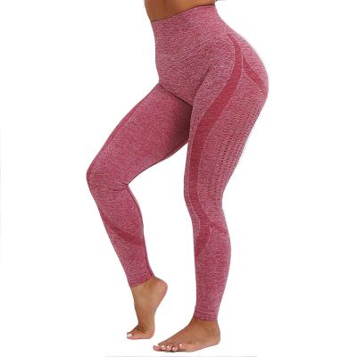 China 2021 Fashion Hot Sale Sports Breathable Seamless Pants Slim Hip Lifting Hollow Fitness Pants Yoga Women Pants for sale