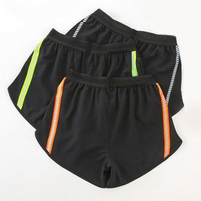 China Breathable Anti-wrinkle Men's Gyms Fitness Bodybuilding Shorts New Men's Sports Fluorescent Shorts for sale