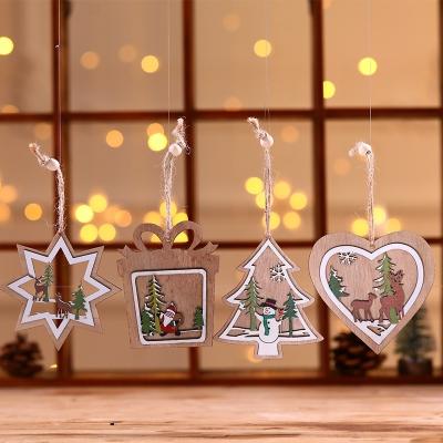 China Educational DIY Toy Set Christmas Decorations Hollowed Christmas Tree Five-pointed Star Small Wooden Pendant for sale