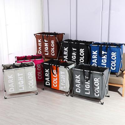 China Eco-Friendly and Economical Laundry Hamper Large Collapsible Basket Organizer Basket Three Grid Storage Waterproof Home Laundry Hamper for sale