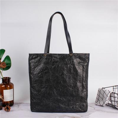 China Eco-friendly and economical durable paper lightweight strong tote bag and water-resist dupont tyvek bag for sale