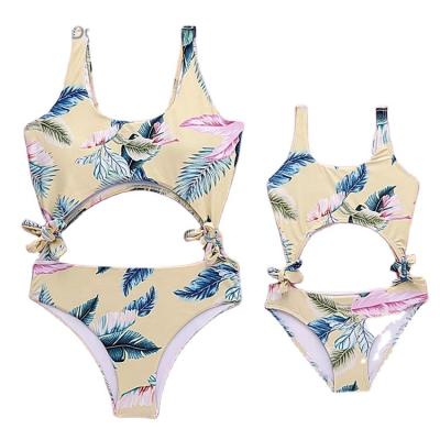 China Sexy Side Tied Bikini Swimwear Non-Toxic Breathable Hollow Out Floral Print Mommy And Me Bikini Swimwear for sale