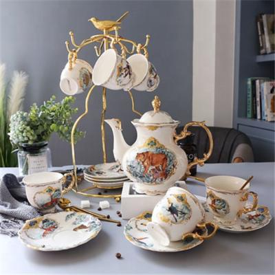 China New Arrival 20 Pcs Viable Gold Stand Cup Holder Jungle Porcelain Coffee Nordic Luxury Tea Sets for sale