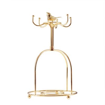 China Viable Creative Household Gold Bird Coffee Cup Saucer Stand Stainless Holder for sale