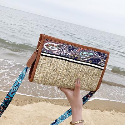 China 100% 2021 Eco-friendly Fashion Purses And Handbags Wholesale Simple Woven Bag Cross - Body Shoulder Straw Beach Bag for sale