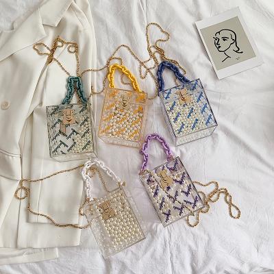 China 100% 2021 Summer New Korean One-Shoulder Messenger Eco-friendly Transparent Evening Bag Female Chain Clutch Bags for sale