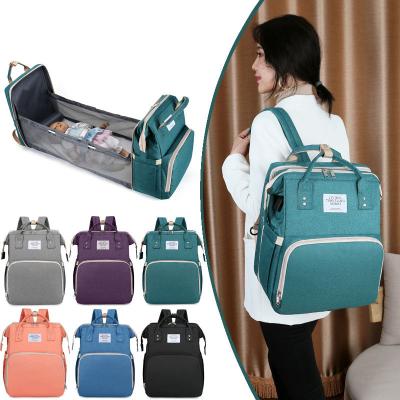 China With USB Portable Crib Many Side Pockets Water Proof Multifunctional Baby Mama Backpack Bed Diaper Bag for sale