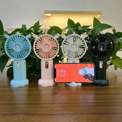 China High Quality Cute Mini Fan Brushless Motor Portable Bracket Small Fan Handheld Rechargeable Battery Charging Cooling USB Electric Fan for sale