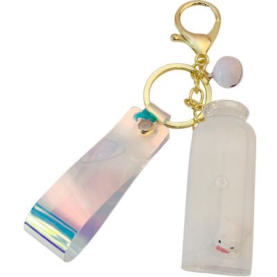 China Fashional Souvenir Gifts Sample Free Cute Floating Chain Liquid Floating Key Fob Men Women Gift Keychain Charm Milk Key Chain Bag Pig Quicksand Key Fob for sale