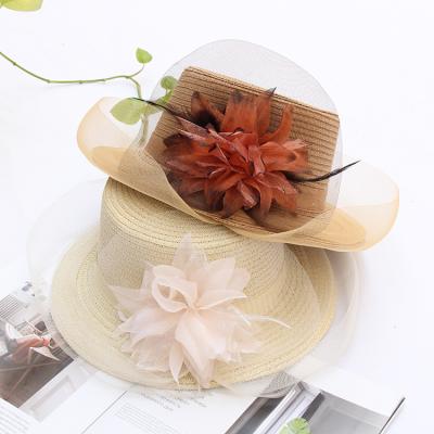 China New Picture Fashion Summer Ladies Bundle Straw Hats Organza Net Yarn Flowers Sun Hats Women Wide Brim Fedoras for sale