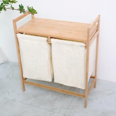 China Minimalist Bamboo Wooden Laundry Basket Laundry Hamper With Removable Inner Bags for sale