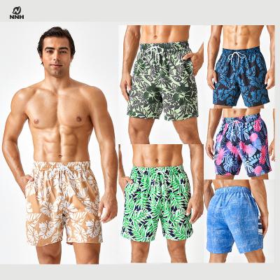 China Fashion Hot Sale Breathable Graphic Men's Board Swim Shorts Graffiti Print Quick Dry Beach Cute Shorts Plus Size Male Swim Trunks for sale