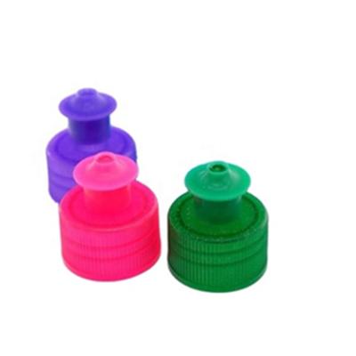 China Hot Selling Non-Refillable Pull Push 28mm Pull Cap Plastic Water Bottle Cap Red And White Non-Refillable Pull Back for sale