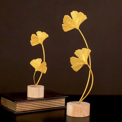 China Europe High Quality Light Luxury Nordic Ginkgo Biloba Biloba Gold Iron Ornaments Craft For Living Room Bedroom Decor for sale